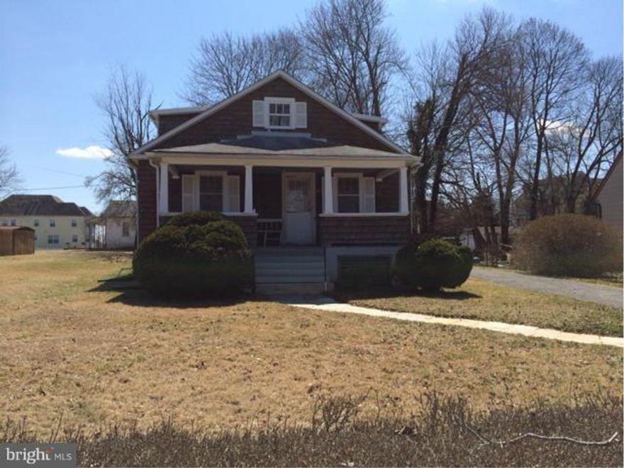 Large front porch.Long driveway with parking pad. Two bed rooms on main level. Attic has room to add more bedrooms. Close to  public transportation and shopping. Property sold "AS IS".