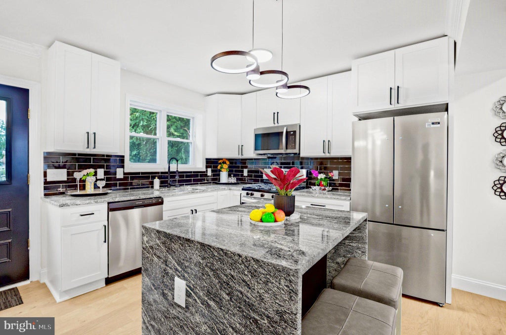Photo of 702 Rittenhouse Street, HYATTSVILLE, MD 20783 (MLS # MDPG2222180)