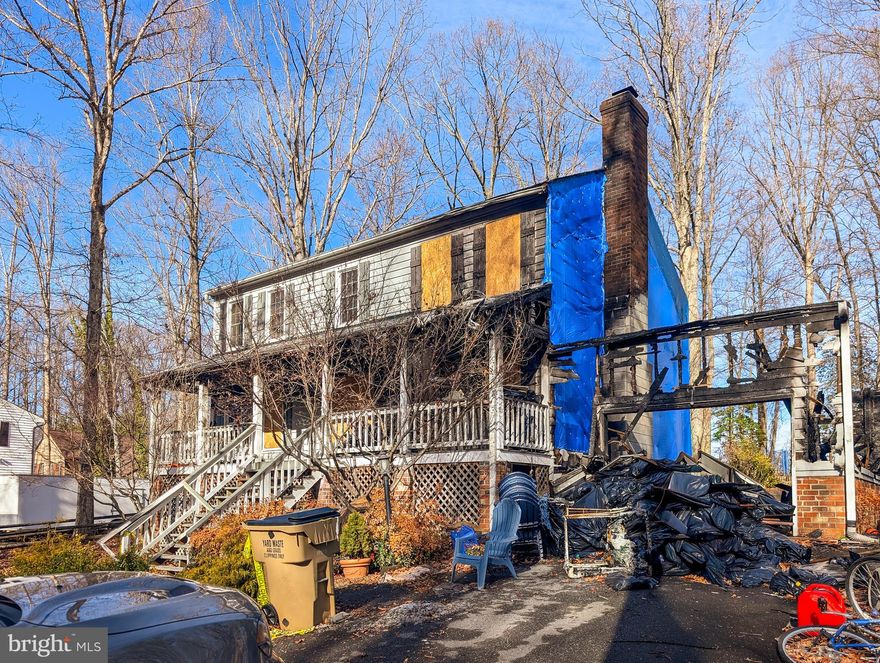 This 3 Level Colonial has experienced major fire damage and is being sold as-is, offering a unique opportunity for reconstruction. While the home will require extensive work, it's the intangibles that make this an even better opportunity, including a lot and backyard settings that are standout features — The level lot is located at the end of a quiet culdesac, backing to woods and is full of possibilities.  For those with vision, this property provides the chance to rebuild and create something new in a very desirable, amenity filled, community with similar size updated home comps well into the $600,000s.  Buyer to conduct all inspections and verify feasibility.  Aquia Harbour Amenities include: Two Pools; State Certified Police Force; Fire Dept; Marina w/Boat Ramp & Fishing Pier; Kayak/Canoe Launches; Golf Course w/Pro Shop, Putting Green, Driving Range; Dog Park; Horse Stables, Riding Areas/Trails & Pens; Secure Storage Lot; Community Garden; PreSchool; Fishing Park; 8 Other Parks w/Tot Lots, Tennis, Basketball & Abundant Wildlife Including Bald Eagles in the Sky Above! The Harbour also features Great Community Events including Independence Day Celebration w/Fireworks, Oktoberfest, Movie/Game Nights and So Much More!!!! ***Any Offer Submissions Prior To and Over the Weekend Need to be Received by Sunday Night 3/8 for Review and Response on Monday 3/9***