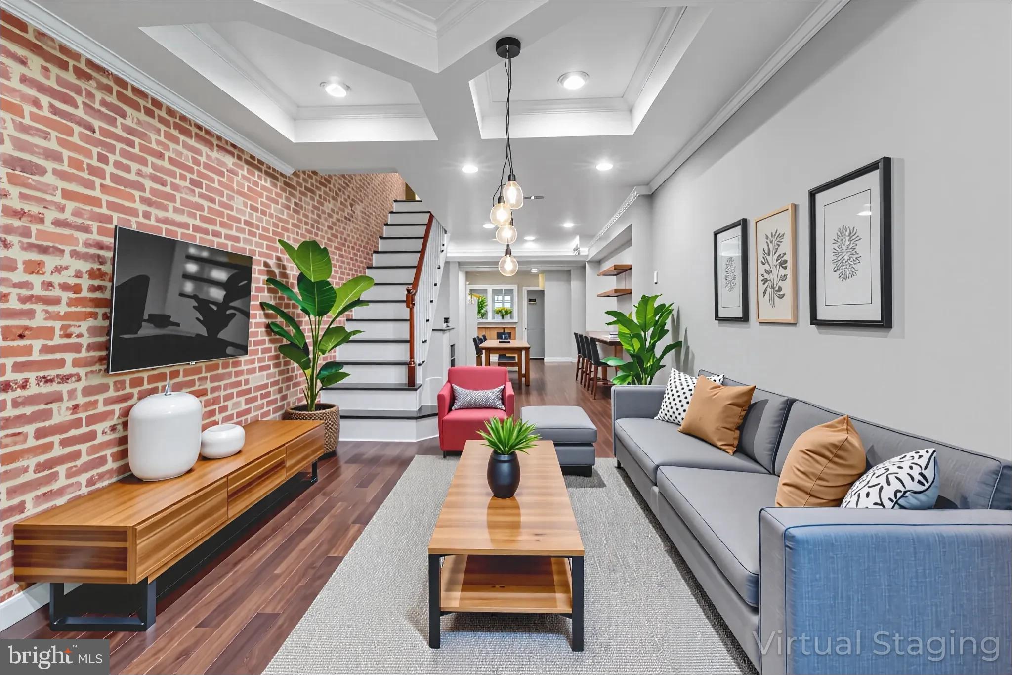 Welcome to 1122 Sargeant Street — a vibrant and move-in-ready row home in the heart of Baltimore’s historic Pigtown/Washington Village neighborhood. This spacious 3-bedroom, 3-full-bath home offers a unique blend of modern updates and classic city character, with thoughtful touches throughout that make it a rare gem in an evolving and exciting community. Step inside to an open-concept main level featuring striking coffered ceilings, a brick accent wall, recessed lighting, and gleaming hardwood floors. The updated kitchen boasts granite countertops, a large wood island, soft-close cabinetry, a deep stainless steel sink with garbage disposal, and a full suite of stainless steel appliances including a gas range, microwave range hood, dishwasher, and large refrigerator—perfect for cooking and gathering. Upstairs, you'll find soft carpet underfoot, a spacious primary suite with a private bath, and a second bedroom that works equally well as a guest space or home office, along with a second full bath in the hallway. The fully finished basement offers a versatile bonus room, a third full bathroom, laundry with front-loading washer and dryer, and ample storage space. One of the home’s most coveted features is the expansive, enclosed two-car parking pad with a locking steel gate and private access door—a rare find in Pigtown. The outdoor space includes low-maintenance turf and a cozy patio area ideal for relaxing, entertaining, or enjoying your own urban garden bed. Recent upgrades include a brand new roof (2023) and iron security bars over front entry points and locking steel gate to parking area. The home is equipped with a SimpliSafe security system and Eufy video doorbell, both of which convey. Located on a tucked-away street just steps from Carroll Park, the B&O Railroad Museum, and a growing lineup of neighborhood favorites like Swill by Blacksmiths, The Stoop Coffee, Culinary Architecture, Nick’s Rotisserie, and Mystique Barrel Brewing. You're just a short walk from M&T Bank Stadium, Camden Yards, and the University of Maryland Medical Center, with easy access to I-95 and the BW Parkway for stress-free commuting. 1122 Sargeant Street offers the perfect combination of comfort, convenience, and city energy. This one truly checks all the boxes. Don't miss your chance to make it yours.