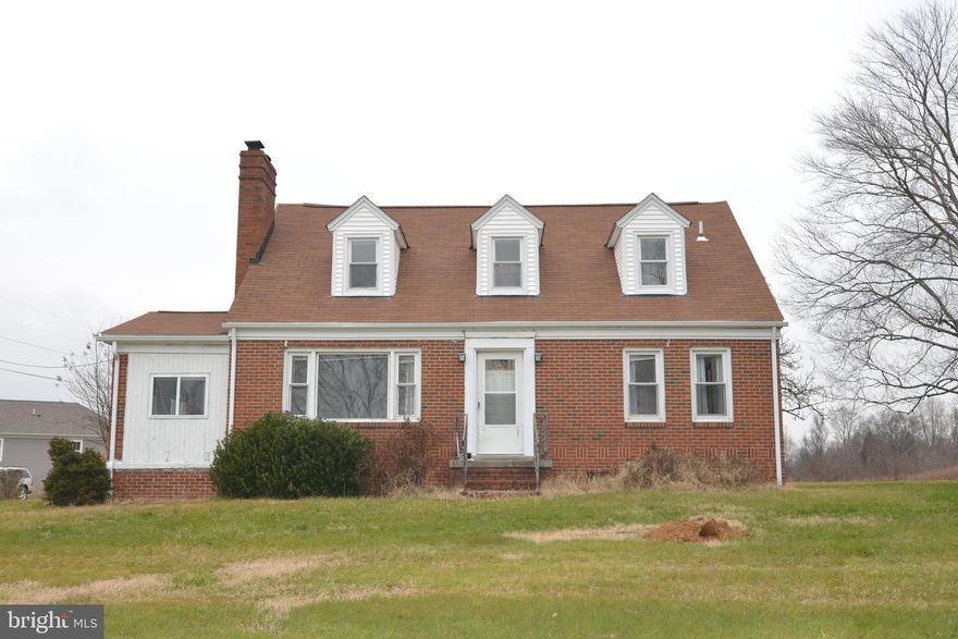 Spacious 4BR 2FB Cape Cod on an unfinished basement.  The main level of the property features a large living room with a wood stove fireplace insert, kitchen, dining room, two bedrooms and a full bath.  There is also an extra room for a den, home office or whatever best suits your needs on the main level.  On the upper level are two more bedrooms and a full bath.   The laundry area is in the unfinished basement.  Plenty of room for off-street parking on the paved driveway.  This hill top home is situated on a 4.14 acre lot.  Pets are case-by-case basis.