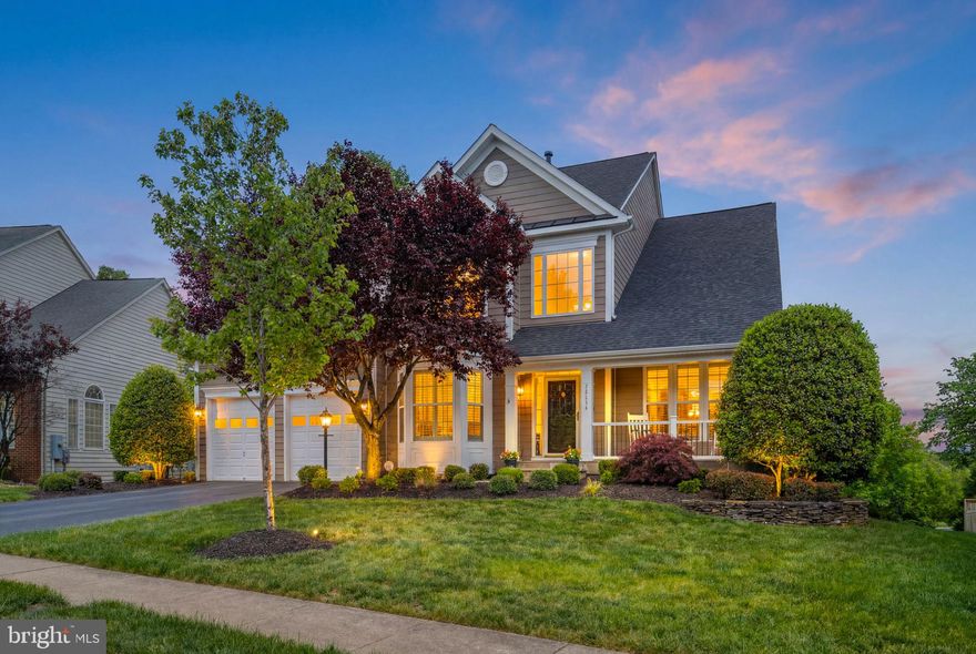 Welcome to 22188 Windy Pine Court, a meticulously upgraded 5-bedroom, 4.5-bath Van Metre Sinclair II tucked into a quiet cul-de-sac in sought-after Broadlands South. Thoughtfully enhanced well beyond its original build with substantial owner investment in major systems, premium finishes, and standout outdoor living.

The main level features a gourmet kitchen with KraftMaid cabinetry, granite countertops, GE Profile appliances, and both under- and over-cabinet lighting. The open layout flows seamlessly into spacious living and dining areas accented by upgraded crown molding, while a private office with custom bay window bump-out delivers an ideal work-from-home setting. Plantation shutters, woven blinds, and brand-new carpet run throughout.

Upstairs, the primary suite offers a renovated shower with frameless glass enclosure. Custom Elfa closet systems are installed in the primary, additional bedrooms, pantry, and laundry room for exceptional organization.

The finished lower level lives like a private second suite, ideal for guests, extended family, or in-law living. A dedicated media room features a tray ceiling, uplighting, and projector pre-wiring. The fifth bedroom (currently used as a gym) sits adjacent to a full bath and is anchored by a well-appointed wet bar with refrigerator, dishwasher, and sink.

The home's signature outdoor feature is the expansive three-season room with vaulted ceilings and EZ-Breeze windows, blurring the line between indoor and outdoor living year-round. Step out to a Trex Transcend deck with custom railings and an expansive brick patio below, framed by mature trees - a true entertaining setting.

Major capital improvements provide rare turnkey peace of mind: 2021 CertainTeed Landmark Class 3 impact-resistant roof with transferable warranty, dual-zone HVAC (Lennox 2017, Rheem 2023), upgraded insulation eliminating upper-level temperature imbalance, upgraded electrical panel, 2018 water heater, oversized 6-inch gutters, and durable HardiePlank siding. Additional features include a Tesla Level 2 EV charger and a fully integrated security system with locks, smoke, and CO detection.

Broadlands is a 1,500-acre master-planned community known for natural beauty and an active lifestyle: three outdoor pools, nine tennis courts plus pickleball, a daily-access fitness center, a 5,000 sq ft Nature Center, miles of walking and biking trails, and year-round events including the beloved "Broadlands Live!" summer concert series. HOA includes common area maintenance, snow removal, trash and recycling, high-speed fiber internet (Southern Walk), and full amenity access.

Served by top-rated Mill Run Elementary, Eagle Ridge Middle, and Briar Woods High Schools. Minutes to the Dulles Greenway, Route 7, Ashburn Silver Line Metro, Dulles International Airport, and the shopping and dining of Broadlands Marketplace and One Loudoun.