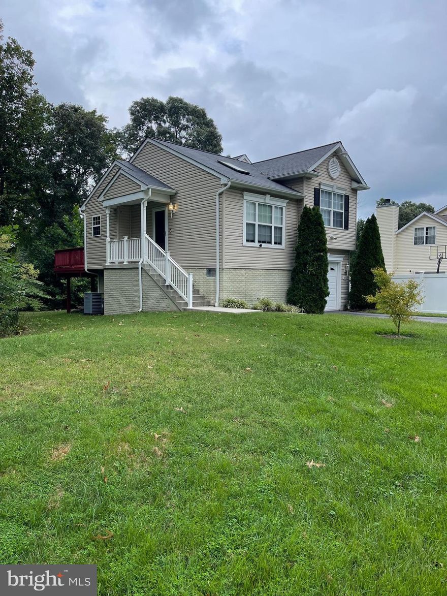 Welcome home.  This 2 bedroom 1 bath house is in immaculate condition. The owner has made it move-in ready.  The home features high ceilings, lots of light, and newly installed sunlight with blinds in the living room. The extra-long garage is plenty of space to park your car and have a hang-out spot. The refrigerator and mounted TV stay in the garage for your use. The large crawl space is temperature-controlled which allows for tons of storage without worry. The primary bedroom is spacious and will accommodate a king bed with a dresser and nightstands. The private backyard is ready for you to relax. This home is conveniently located to water access, downtown Annapolis, Baltimore, and DC. Lake Waterford Park is a 2-minute walk from the house which has a nice body of water, trails, tennis courts, basketball, a playground, wildlife, birds, fishing, and cookout areas. It is always very active. The owner requires proof of insurance to cover the dwelling at $300k.