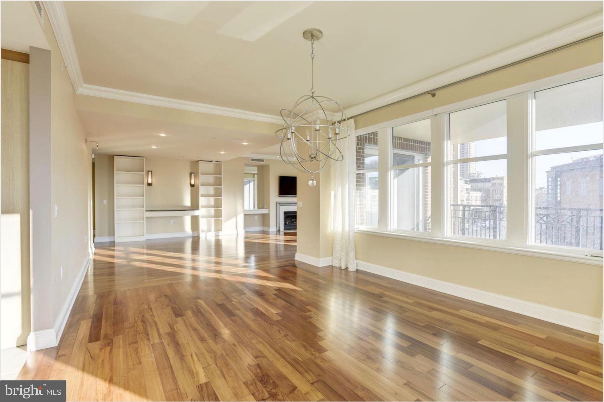 Owner is open to a multi-year lease.
Experience luxurious waterfront living at its finest in this expansive 2-bedroom, 2.5-bath corner residence at the prestigious Ritz-Carlton Residences on Baltimore’s Inner Harbor. With over 2,650 square feet of sun-filled interior space and an additional 150-square-foot private, tiled terrace, this fourth-floor home offers panoramic views of Federal Hill, Rash Field Park, and the harbor. The chef’s kitchen features granite countertops, Sub-Zero and Viking appliances, and built-in refrigerated beverage centers. The spacious primary suite includes a walk-in closet, deep closet, linen closet, and a coffee bar, while the second bedroom offers an en-suite bath with custom stonework and its own walk-in closet.
Designed with both comfort and function in mind, the residence also features a spacious laundry room as part of a thoughtfully designed Butler’s Pantry, offering extensive cabinetry and a large storage closet. Residents enjoy access to a host of five-star amenities, including on-site dining, luxurious guest suites, a full-service marina, private wellness spa, indoor pool, fitness center, screening room, billiards lounge, conference and event spaces, and a beautifully landscaped private courtyard. This is Inner Harbor living redefined—where elegance, convenience, and service converge in a truly world-class setting.
