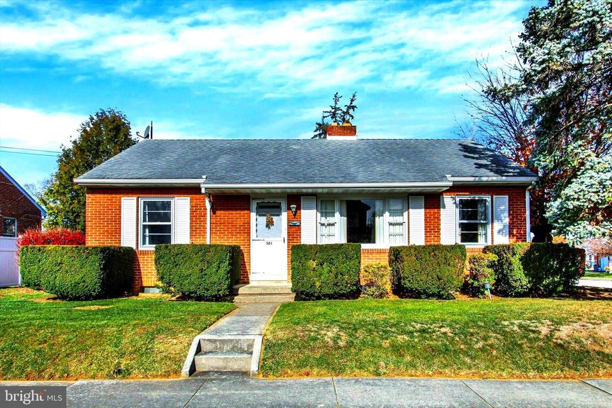 Welcome to 301 5th Street. Located in Hanover borough situated in a lovely quiet neighborhood. 
They don’t build homes like this anymore. This home has been loved by the same family since it was built and is now waiting for you to build memories and add your own touches.  A little TLC will make this home shine! When you arrive, you will see it is situated on a large corner lot with mature trees. Walking around the property, the feeling is calm and peaceful. Entering the home, the living room is large and features a wood burning fireplace and upgraded flooring. The fireplace would provide the perfect ambiance for any mood. The large front windows are perfect for the Christmas tree! Adjacent to the living room is a cute dining nook/breakfast area. Perfect for your morning coffee or breakfast. The kitchen may be small, but it is cute and has direct access to the back porch/yard. This is convenient for cooking on the grill or enjoying the back yard in the summer. Off the kitchen, the formal dining room. Over the years, the family have used this room for both a formal dining room and even a 3rd bedroom as needed. You could use this space for a home office, or playroom. Also on the main floor, the two bedrooms and a full bathroom. The layout of this home is perfect for anyone looking for a well-built, easy one-floor home with no HOA.  Come take a view and make this your next home.