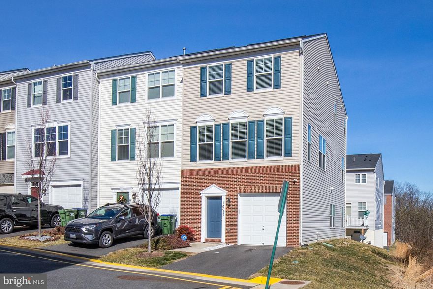 **OFFER DEADLINE 5PM MONDAY 2/8** Beautiful 3-level END UNIT townhome with attached garage! Light-filled main level features spacious open  layout w/ large living and dining areas, gleaming wood floors, and GORGEOUS updated kitchen with stunning dark cabinetry, sleek granite counters, all stainless steel appliances, and large island. Other fantastic main level features include wood flooring, crown molding, chair railing, recessed lighting, dining area statement light fixture, 1/2 bath, and walkout to large deck. Upper level features 3 bedrooms and 2 full bathrooms, including large primary suite with separate sitting area, walk-in closet, and luxe en-suite bathroom boasting dual vanities, soaking tub, and oversized shower.  Expansive walk-out level basement offers a huge  family room flooded with natural light, walkout to lower level patio, 1/2 bath, foyer, and entrance to attached garage.  Enjoy neutral paint throughout, bedroom level washer/dryer, and TONS of closets and storage spaces throughout! Amenities at Village at Woodstream condos include swimming pool, basketball courts, club house, walking paths, and tot lots! Great location - convenient to I-95, shopping, dining & more!