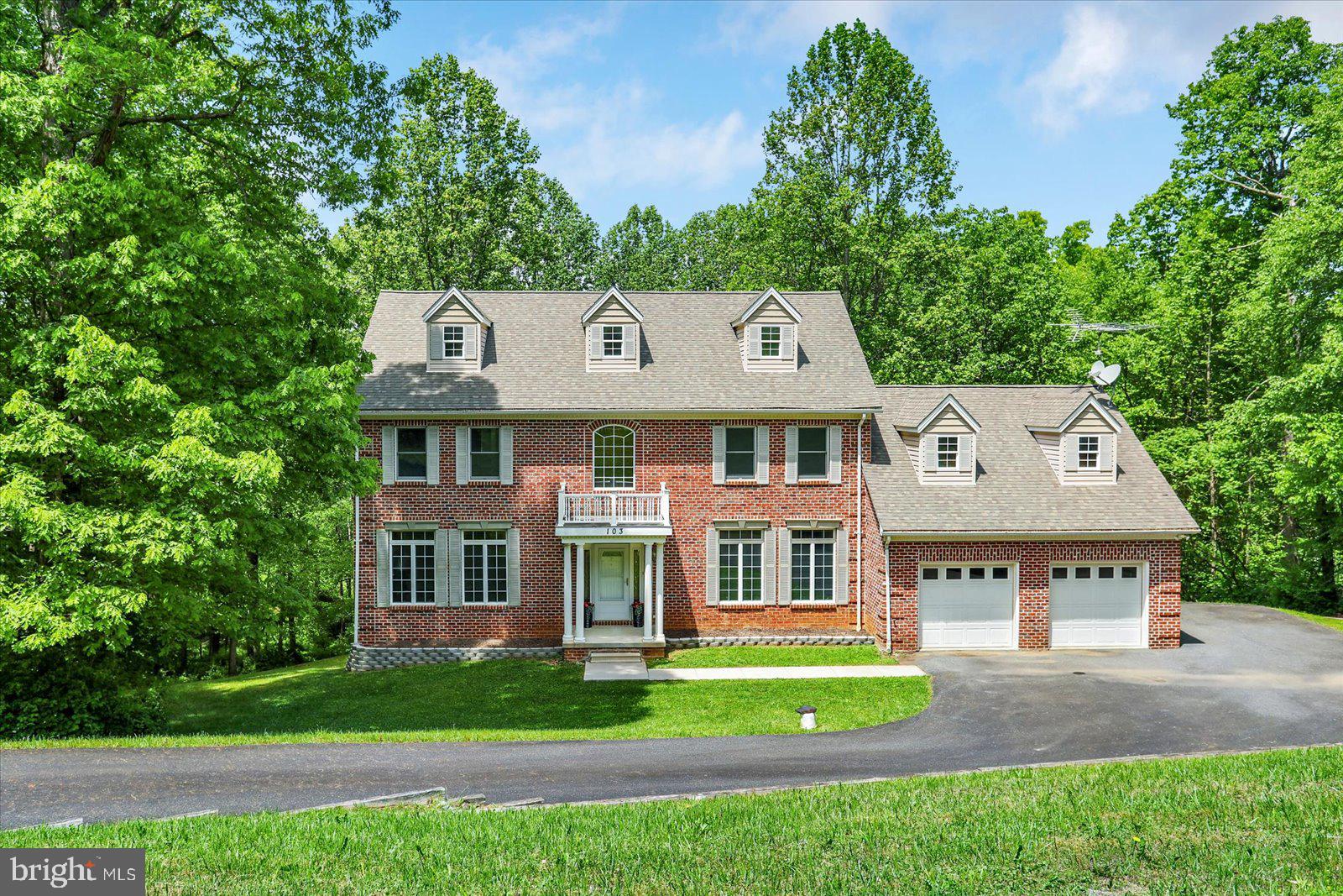Experience Elevated Living in a Peaceful, Private Setting
Nestled on a scenic 1.26-acre lot that backs to tranquil woods, this exquisite two-story brick-front Colonial offers the perfect balance of rural serenity and refined comfort. Prepare to fall in love with a lifestyle that feels like a retreat—without sacrificing space or sophistication.
Step inside to a grand entryway that sets the tone for gracious living and effortless entertaining. With generous square footage, this home offers flexible spaces for everyday life and special occasions alike.
Upstairs, you'll find four spacious bedrooms and two full baths, while a versatile main-level bonus room—conveniently located next to a full bath—offers the potential for a fifth bedroom or a dedicated home office. The expansive daylight basement, complete with its own full bath and walk-out access to the backyard, is a blank canvas ready for your personal touch.
Recent updates include a brand-new Lennox high-efficiency Energy Star heat pump system (2025) and a new propane water heater (2024), Prior to listing, the Seller had a full septic inspection completed with a licensed septic company and is happy to provide documentation of the passing results. All of this is sure to provide peace of mind for years to come! Although 20 years old; this home was VERY lightly used as it was a second home to the Sellers and very rarely occupied. The gas fireplace has never even been used. When you walk in; it literally smells like a new construction home.
Don’t miss the chance to make this private, picturesque property your next home!