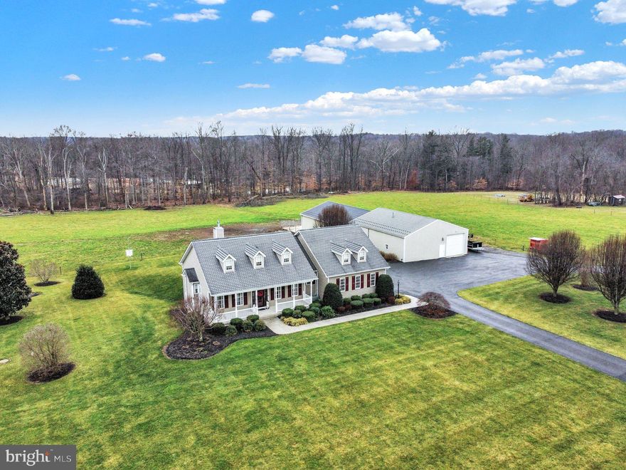 Nestled in the tranquil landscapes of Darlington, Maryland, this 12.69-acre farm offers a picturesque setting. The 2,303 square foot custom-built home offers three bedrooms, two and a half bathrooms, nine-foot ceilings, a stone fireplace, hardwood floors, crown molding, kitchen breakfast bar, and has been meticulously cared for. Put your finishing touches on the full, walk-out level unfinished basement. Enjoy the serenity on the composite deck or cool off in the above-ground pool. The property boasts custom-built cattle pens, electric fencing, with 9 acres dedicated to lush pastures. There is a 40 by 110-foot pole barn, featuring a butcher shop, walk-in freezer, walk-in box, railings, hay and equipment storage, an office and restroom, and so much more! This idyllic retreat combines modern amenities with the charm of rural living in a quiet, scenic area. Call to schedule your showing today!