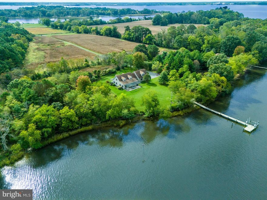 $200K Price Reduction!!  Located on the quiet waters of Bolingbroke Creek, this 5.9 acre parcel is improved by a custom 3,000 sq. ft. Cape Style home which was custom built in 1998. With a modern open floor plan, first floor primary suite, two car garage and expansive water views, this property boasts exceptional privacy, good water depth for boating and access to the Choptank River. There is an additional 1,434 sq. ft. of unheated space comprised of walk up second floor storage, two car garage and shop. Side and waterside setbacks would permit a waterside pool.