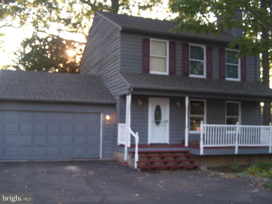 WONDERFUL COLONIAL  W/WATERVIEWS OF BROADWATER CREEK, UPGRADED KITCHEN W/BREAKFAST BAR THAT OPENS TO DINING AREA, FAMILY ROOM W/FIREPLACE, GLEAMING HARDWOOD FLOORS THRU OUT THE MAIN LEVEL, MASTER BEDROOM W/FULL BATH. SEP LAUNDRY ROOM....FENCED REAR YARD FEATURING LG. 2 TIER DECK W/HOT TUB & PATIO.   2 CAR GARAGE, OVERSIZED PAVED DRIVEWAY FOR BOAT/RV, COMMUNITY PIER & BOAT RAMP.  PRICE TO SELL!!
