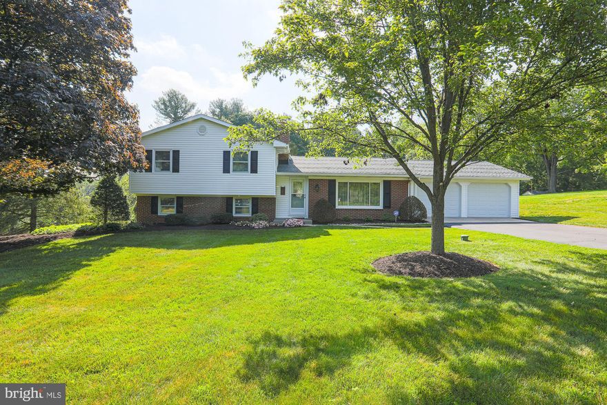 COZY 3 Bedroom 2 Full Bath Split Level on a BEAUTIFUL one acre lot in Jarrettsville * Features Include: SPACIOUS living room with plenty of SUNLIGHT * Hardwood floors under the carpet * Three bedrooms and one FULL bath complete the upper level  * On the LOWER level you will find a LARGE family room with WOOD burning fireplace, office/4th bedroom and FULL bath * TWO car garage and MULTIPLE car driveway * A MUST SEE!!