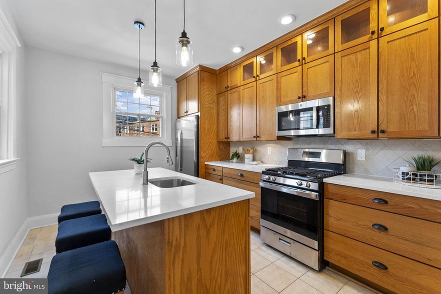 Welcome to this beautifully updated townhome, offering a perfect blend of modern style and comfort. Featuring 3 spacious bedrooms and 1.5 bathrooms, this home has been renovated to meet today’s living standards while maintaining its charm.  Upon entering, discover an open, light-filled layout with stylish finishes throughout. The kitchen has been completely revamped with modern cabinetry, sleek countertops, and stainless steel appliances.  Upstairs, you'll find three generously sized bedrooms with a full bathroom elegantly redesigned.  The convenient half-bath is located on the main level which adds extra functionality for guests.  Located in a desirable neighborhood with easy access to local shops, schools, and parks, this home offers both convenience and comfort.