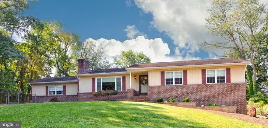 ***Includes a .48 acre lot connected to the right side of the home which makes the total property almost a full acre. Tax ID 04020218100431**  ONE FLOOR LIVING AT IT'S FINEST****BEAUTIFULLY MAINTAINED 3 BED 2 BATH BRICK RANCHER WITH OVER 4,000 SQ. FT. HOME BOASTS OF BEAUTIFUL HARDWOOD FLOORS, NEWER SUNROOM ADDITION W/ CATHEDRAL CEILINGS /CUSTOM BLINDS /LIGHTED CEILING FAN /SEPARATE AC UNIT & SLIDERS TO REAR DECK. LIVING ROOM W/ WOOD BURNING BRICK FIREPLACE, FRESH PAINT, NEW CARPET. HUGE FAMILY ROOM OFF KITCHEN W/ STONE ACCENT WALL AND PEDESTAL FOR / WOOD STOVE, SEPARATE DINING AREA OFF KITCHEN, RECENTLY UPDATED KITCHEN W/ X-TRA LARGE KITCHEN SINK AND NEW BACKSPLASH. NEW LARGE HALL BATH W/ NEW CABINET & GRANITE COUNTERTOP/ NEW CUSTOM TILED SHOWER/TUB. THREE NICE SIZE BEDROOMS W/ SIX PANEL DOORS, AND THE MASTER SUITE HAS A WIC, NEWLY UPDATED MASTER BATH SINK & CABINET W/ GRANITE COUNTERTOP, & NEW TUB/SHOWER TILE, NEW FIXTURES, NEW THERMOSTAT. THIS PROPERTY IS SITUATED ON ALMOST A 1/2 ACRE LOT & HAS AN OVERSIZED 2-CAR ATTACHED GARAGE W/ 2 AUTO DOOR OPENERS, WORKBENCH, ROOM FOR STORAGE, EXIT DOOR TO, DUAL DRIVEWAYS W/ PARKING FOR 8. FULLY FENCED LARGE REAR YARD. *** CALL PATRICIA PARKS @ 410-978-4822 with any questions.