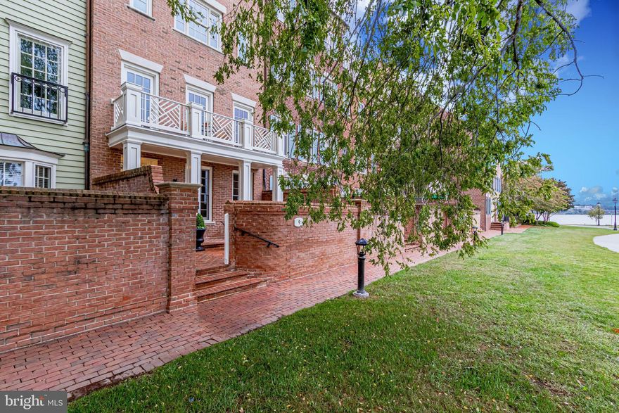 Wake up every morning with STUNNING views of the water and you will instantly feel a world away. Welcome to 9 Wilkes Street. This extraordinary waterfront oasis offers three bedrooms, three full and two half bathrooms on five expansive floors with a private elevator. Enjoy all that Harborside has to offer from the comfort of your beautifully designed brick patio and just steps away from your private boat slip. This rare and spectacular home truly brings the outside in with amazing water views throughout. Entertaining is a dream in the spacious open-plan living and dining room complete with a gas fireplace and balcony overlooking the water. Moving upstairs, the luxurious owner's suite offers water views, a gas fireplace, a walk-in closet and a spa-like en suite bathroom. The additional bedrooms and two full bathrooms are located on the upper levels. The home also includes two assigned garage spaces with direct home access. Centrally located in the heart of Old Town, this home is just steps away from parks, walking trails, shops, restaurants, entertainment venues and historic landmarks.