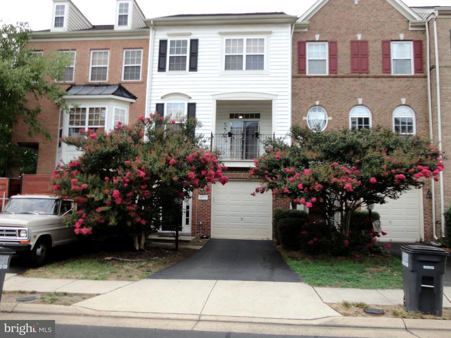 Immaculate 1 Car Garage Townhouse, Perfect Spacious with 2,100+ Sq Feet on 3 level 1 Car Garage Townhouse in Stone Ridge community - Most sought-after Amenities-Rich. Move in Ready Home with Fresh Coat of Bright Custom Neutral Paint with Upgraded LED lights  in all 3 Levels. Professional Prepared Ready for Move in .. Renovated Kitchen and Bath cabinets , Upgraded with Some Stainless steel Appliances ,Walk into the Inviting Foyer. Main Upper Level1 has Wide open floor plan with spacious Upgraded flooring living room, Chefs Kitchen with upgraded appliances and Dining Area has gleaming hardwood Floors with Half Bath walks out to an Upgraded Large Deck . , Upper Level 2 has Large Master Bed with full bath and Shower Tub, 2 more Bed Rooms with Access to One Full common bath on the upper level with Laundry located in the Upper Bed Room Level and Lower Level Large Recreation Room with half Bath with  Surround Fireplace, Walks Out to Large Fully Fenced Yard. Walking distance to Library, Shopping Mall, and Park and ride ( Bus service to DC ). Lot of visitor Parking behind the house. This home is located at walkable distance to Park and Ride to DC and Metro Station, Gum Spring Library, Stone Springs Hospital, Physicians offices, Shopping and minutes from Route 50 and Route 606. This home is move in ready and located in a community loaded with amenities including an Multiple Outdoor Pools, MultipleTennis Courts, club house, walking/jogging trails, exercise room, sports courts, playgrounds, tot lots Nearby Harris Teeter, Walmart, Target, Costco, Dulles International Airport, Silver Line Metro and so much more!. Available for Move in Now