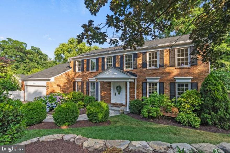 Nestled in the highly sought-after Seminary Ridge community, 3804 Griffith Place offers the perfect blend of tranquility and convenience. Set on a quiet cul-de-sac, this home boasts lovely views of the tree tops from the deck, providing a serene retreat from the hustle and bustle of Alexandria while still having unbeatable access to the surrounding Washington metropolitan area. Situated on a generous quarter-acre lot, there’s plenty of room for a garden, play, or entertainment. This property features one of the largest models available in the area, designed with grand rooms that are perfect for comfortable entertaining and relaxed everyday living. Classic details abound, including crown molding, chair rail accents, built-in bookshelves, and hardwood floors, adding timeless elegance to the home.
The spacious eat-in kitchen is a chef’s delight, with ample cabinet space, granite countertops, and stainless steel appliances. Upstairs, you'll find four large bedrooms and two baths. The primary suite is a true sanctuary, complete with a walk-in closet and an ensuite bathroom. The uniquely designed finished lower level is perfect for guests or an au-pair, featuring a bedroom and bath. There is also a second bath with a jacuzzi tub.   The large two-car garage includes storage space, while the renovated laundry room comes equipped with a folding shelf and pantry cupboards.