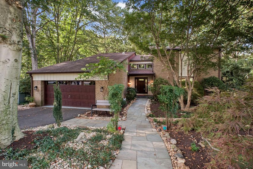 Absolutely *SPECTACULAR* 6BR/3.5BA contemporary on 3 finished levels in coveted Chain Bridge Forest, offering dramatic 2-story foyer, walls of glass, and sweeping wooded views that feel like a private retreat! This stunning home dazzles with expansive multi-level decks, a gourmet renovated kitchen with breakfast bar, Viking appliances, elegant living and dining rooms, and three fireplaces that bring warmth and style. The expansive primary suite is a true sanctuary with spa bath, oversized closets, and breathtaking views, while the versatile walk-out lower level boasts a huge rec/family room, additional bedrooms, and abundant storage. Nestled on a serene .37-acre lot with a 2-car garage, on a quiet no-through street, and located in the Chesterbrook, Longfellow and McLean school pyramid — this home truly has it all!  **PROFESSIONAL PICS will be uploaded this weekend!**