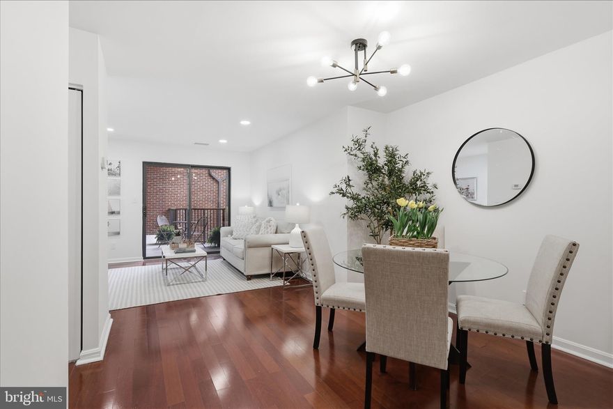 LOCATION! LOCATION! LOCATION! Beautifully updated 1BR/1BA condo just 1 block to the Ballston Metro! Located in a boutique 40-unit building, this home offers a remodeled parking garage, one assigned conveying garage parking space (#405), extra storage, and a charming courtyard setting.

The light-filled interior features Brazilian cherry engineered flooring, an open living and dining area with recessed lighting, and sliding glass doors leading to a private balcony overlooking the courtyard.

The updated kitchen includes GE stainless steel appliances, subway tile backsplash, refreshed cabinetry, new hardware, and warm white paint throughout. The spacious bedroom offers expansive closet space, while the bathroom features a tub/shower combo, updated vanity, ceramic tile flooring, and upgraded lighting.

Additional highlights include an in-unit stacked washer/dryer, fresh paint, recessed lighting, extra storage, and assigned garage parking with opener.

Unbeatable location just 3 blocks to Ballston Quarter dining, shopping, restaurants, and nightlife — offering the perfect combination of convenience, comfort, and city living!