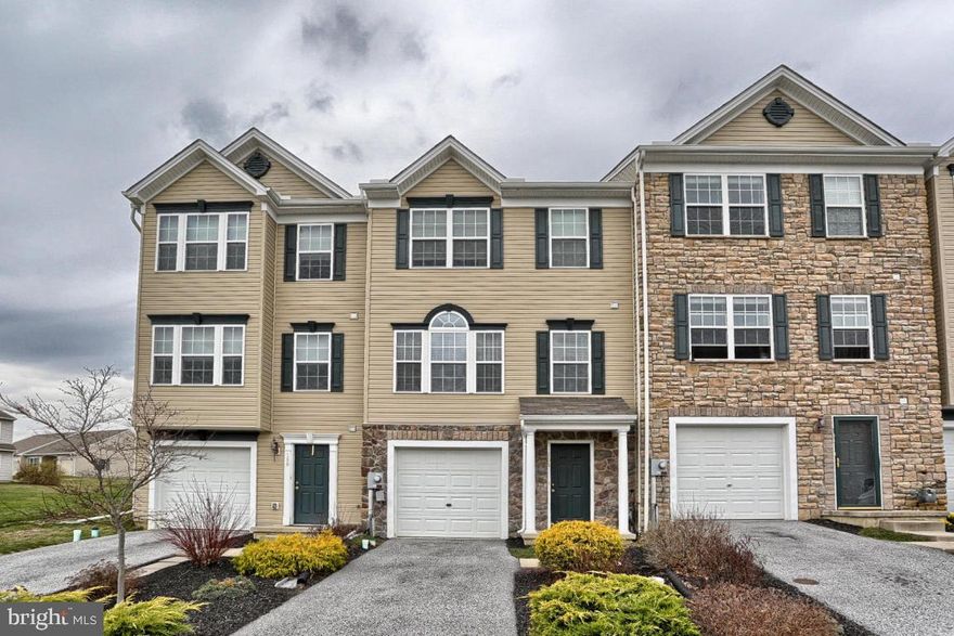 Immaculate 3 Bedroom; 2 Full Bath & 2 Powder Room Townhouse. Kitchen w/ Breakfast Bar Opens to LR with Gas Fireplace. Sliding Doors to Deck. Lower Level Recreation Room. Master Bedroom Cathedral Ceiling- Master Bath- WIC. Rear 12x12 Deck. Hardwood Floors on 1st Floor*New Carpet on 2nd Floor. Gas Heat & Central A/C*One Car Garage