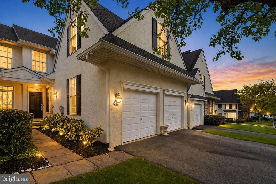 Located in the highly regarded Great Valley School District and set within the desirable Penns Preserve community, this beautifully maintained 3-bedroom, 3.5-bath townhome offers a rare blend of comfort, space, and serene natural surroundings backing to a protected preserve. You’ll instantly feel at home upon entry, where the main level features hardwood floors, recessed lighting, 9-foot ceilings, and a bright, open layout connecting the foyer, living, dining, and family rooms, complete with a gas fireplace and oversized windows that fill the space with natural light. The spacious eat-in kitchen is well-appointed with stainless steel appliances, a recently updated refrigerator, ample cabinetry, and a sunny breakfast area with sliders leading to a private deck overlooking peaceful greenery (deck replaced in 2024). A mudroom, powder room, and access to the two-car garage complete this level. Upstairs, the expansive primary suite features a tray ceiling, two walk-in closets, and an en-suite bath with double vanity, soaking tub, and separate shower. Two additional bedrooms share a convenient Jack-and-Jill bath, and the laundry is conveniently located on the second floor. Brand new carpets have just been professionally installed throughout, adding a fresh, move-in ready feel. The finished walkout lower level, complete with a full bathroom and plumbing for a future bar or kitchenette, offers flexible living space for a rec room, home office, or guest suite, along with additional storage and access to outdoor space. Additional upgrades include a new HVAC system (2024). Enjoy low-maintenance living with exterior and community upkeep handled for you, including lawn care, snow removal, trash service, and common area maintenance. All of this in a tranquil, community-oriented setting just minutes from Whole Foods, Teikoku Japanese & Thai Fusion, Sedona Taphouse, Ellis Preserve, Edgmont Shopping Center, and nearby Okehocking Preserve for hiking, picnicking, and outdoor recreation, with convenient access to major commuter routes.