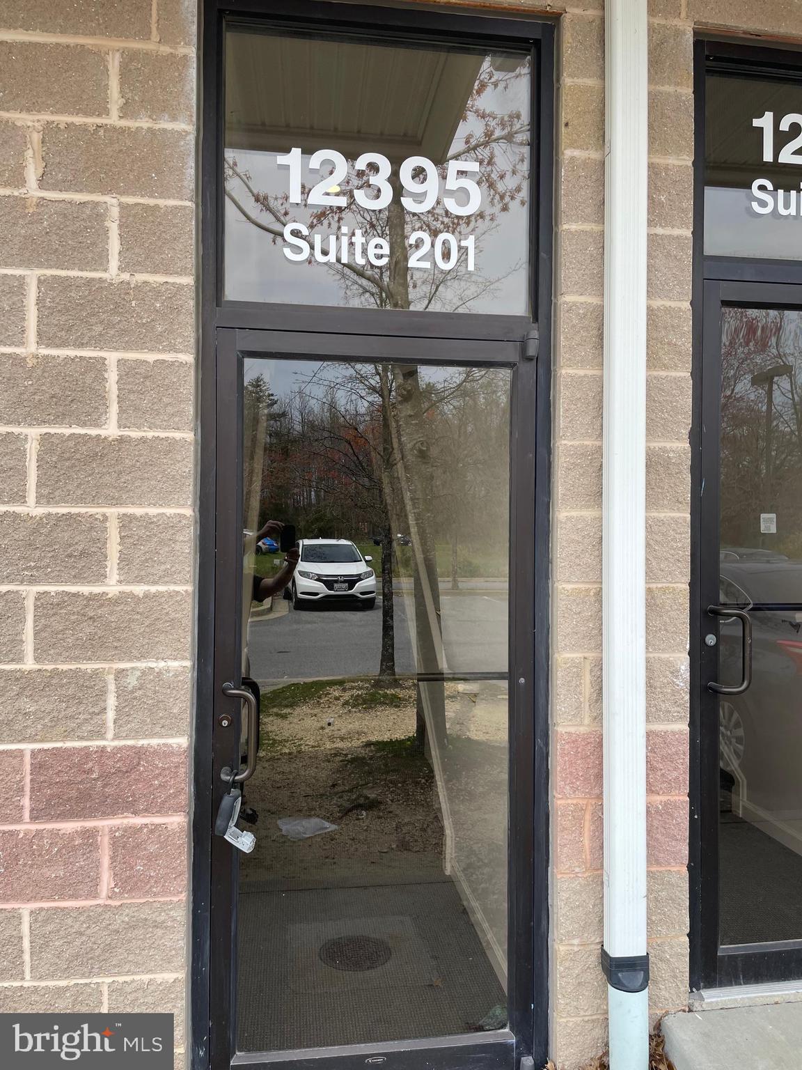 four separate offices sharing a bathroom and kitchenette