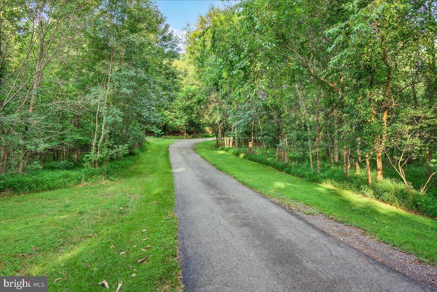 Discover Tranquility, a Rare 38-Acre Retreat in the Foothills of the Catoctin Mountains!  
If you’ve been searching for that rare combination of privacy, natural beauty, and build-ready convenience — your opportunity has arrived.  Nestled just outside of town, this extraordinary 38+ acre property in Frederick County offers an idyllic setting for your future home. I’m thrilled to introduce you to a place that feels like a hidden treasure, tucked away at the end of a mature, tree-lined, paved driveway in the gentle foothills of the Catoctin Mountains.  From the moment you arrive, you’ll notice the peace and quiet — the only sounds are birdsong and the rustling of leaves. This is the kind of place where you can wake up to deer grazing by the creek and spend your evenings watching ducks skim across the pond at sunset.  Speaking of water — this land features two flowing creeks and two picturesque ponds. The larger pond was thoughtfully designed as a duck pond with a functional floodgate, and both ponds have bass and bluegill, making it a haven for fishing and wildlife observation. Nature lovers and hunters alike will appreciate the abundant wildlife, with regular sightings of turkeys, deer, foxes, and rabbits.  Beyond its natural beauty, the property is fully prepped for building your dream home. A recent survey has been completed, on-site electricity is ready, and the well produces an impressive 12 gallons per minute. Even more, the lot is approved for a four-bedroom conventional perc — a rare and valuable advantage in a setting like this.  It’s not often a parcel of this size and character becomes available — especially one that offers such serenity, yet is just minutes from town amenities. Whether you envision a full-time residence, a vacation retreat, or a private hunting and fishing lodge, this land offers endless potential in a truly captivating location.

If you’d like to schedule a private tour or learn more, I’d be happy to walk the land with you and share its story. This is more than just a piece of property — it’s a lifestyle waiting to be lived.
