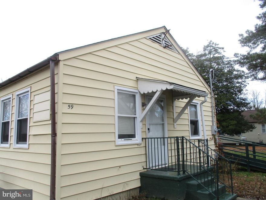 Refreshed 1 bedroom, 1 bath duplex.  New carpet, some new vinyl.  Freshly painted.  Has wheelchair ramp to back door.  Seller can possibly carry note.  Buyeer must be approved for membership.  Pick up buyers packet at the housing office.  Monthly operating payment includes water, sewer, trash pick up, property taxes, master insurance policy, swimming pool,, common grounds and more.