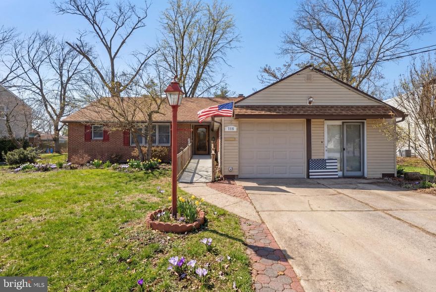 Nestled on a quiet, tree-lined street in the highly desirable Barclay section of Cherry Hill, this home offers over 2,300 sq. ft. of one-story living combined with thoughtful updates and versatile bonus spaces. This expanded Deerfield ranch model stands out with 3 bedrooms, 2 full baths, and two well-integrated additions, creating a flexible floor plan that adapts beautifully to today’s evolving lifestyle needs. 
Step inside to discover a bright and welcoming interior enhanced by hardwood floors, and classic six-panel doors create a bright, polished feel. The living room welcomes you with a cozy fireplace, while the family room features a second fireplace with a full wall brick surround, adding warmth and charm to an additional gathering space perfect for relaxing or entertaining. 
The updated kitchen is both stylish and functional, featuring Corian countertops, a ceramic tile backsplash, and a convenient built-in desk.  Adjacant dining room flow effortlessly, providing comfortable gathering spaces for dinner parties.
The spacious primary suite includes an updated bath designed with modern finishes for a fresh, polished feel. Two additional bedrooms offer generous space and natural light, while the second full bath adds convenience and comfort.
One of the home’s most exciting features is its expanded layout. A dedicated office addition creates a quiet, productive workspace. The bonus room, complete with a private entrance, is currently used for woodworking. This flexible space offers exceptional versatility and could easily function as a fitness room, hobby area, workshop, or private workspace.
Major system upgrades provide peace of mind, including a newer roof (2 yrs.), Newer vinyl siding & windows, 200 amp electrical service, and a newer water heater installed (5 yrs.)
Outdoor living is equally inviting. Step onto the deck to enjoy morning coffee, outdoor dining, or relaxing evenings surrounded by mature landscaping and the natural beauty that defines the Barclay neighborhood.
This home offers convenient access to shopping, dining, major roadways, parks, and Philadelphia-area commuting routes. Combining timeless ranch-style design, modern updates, and exceptional flexibility, 116 Pine Valley Road presents a rare opportunity to enjoy comfort, convenience, and adaptable living in a premier location.