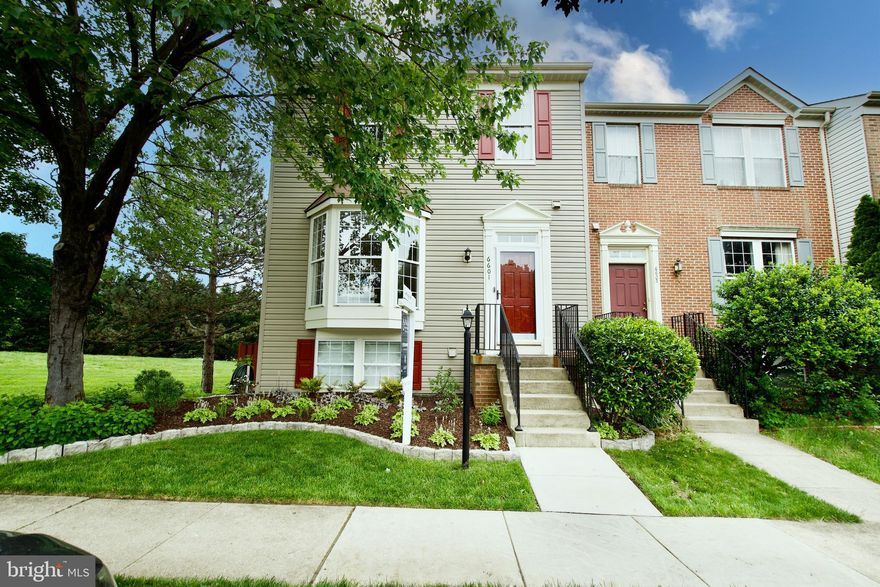 **Assumable VA Loan Available!**  It doesn’t get much better than this! This gorgeous end-unit Providence model backs to trees and is tucked away in Alexandria’s highly sought-after Island Creek community.Step inside to discover an abundance of natural light, gleaming hardwood floors on the main level, and a beautifully updated kitchen featuring granite countertops and stainless-steel appliances. The open-concept layout includes a spacious living room and formal dining area, while the eat-in kitchen flows seamlessly into a bright sunroom/family room that opens to a large deck, ideal for entertaining or relaxing outdoors.
Major systems have been updated for peace of mind, including the roof, hot water heater, and HVAC—all replaced in recent years!  A/C unit just replaced (2025).  Upstairs, the primary suite boasts vaulted ceilings, a walk-in closet, and a private ensuite bath. Two additional bedrooms also feature vaulted ceilings and generous closet space.
The lower level is expansive and inviting, with stylish wide plank porcelain tile (2018), a cozy gas fireplace, a fourth bedroom, full bath, and a laundry room with extra storage. Walk out to a beautiful stone patio and fully fenced yard—perfect for pets, play, or quiet evenings.  Enjoy fantastic community amenities including a pool, clubhouse, tennis courts; and  just minutes from commuter routes, Wegmans, and two vibrant Town Centers.