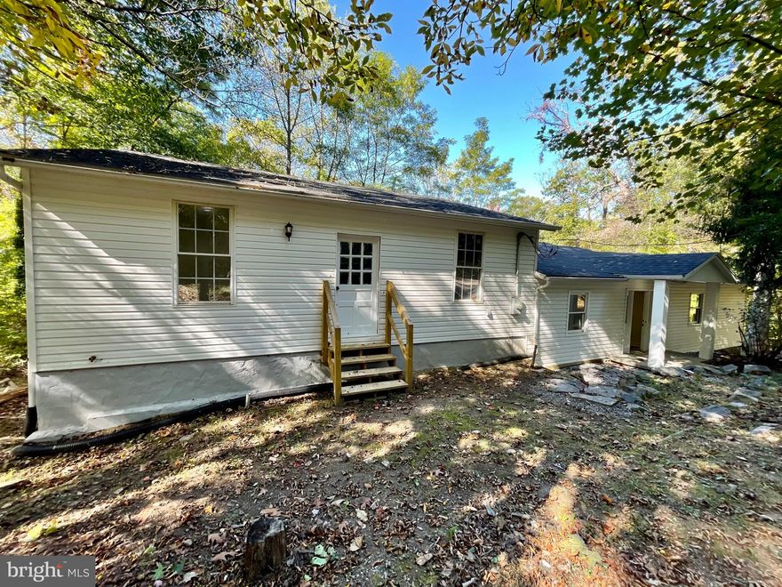 Newly renovated, very spacious rancher!  New roof, siding, heat pump, bathrooms, kitchen, luxury vinyl plank and more! 4 bed, 3 bath home approximately 2200 sq ft posted up in the woods!  Offering a large, private deck space.  You do not want to miss this one!  Could make a great AirBnB, VRBO vacation rental or weekend getaway!  This neighborhood backs up to the Appalachian Trail and is minutes from downtown Harpers Ferry and Harpers Ferry Brewing and 340.  Has public water.  It is believed to have high speed internet.  The community has a fishing pond stocked for the community.  Agent is owner.