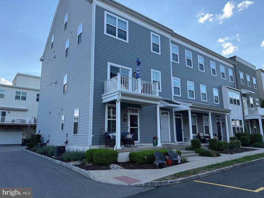 Enjoy amazing water views from the open porch & balcony on this fantastically upgraded, move-in ready, end unit town home closest to the river on Prince George st, 2 bedroom , 2.5 baths(available furnished)! Lovely granite & stainless steel kitchen w/42 inch white cabinets w/upgraded lighting, welcoming office/den flex space as you enter,  hardwood floors throughout, built-in  designer stone fireplace w/remote control & heat control, built-in bar, with gorgeous quartz countertop, wine fridge,cabinets and storage, designer louvered window treatments, custom closet organization throughout. Gorgeous relaxing river front views from the balcony just off the open concept living  room/dining area/ kitchen, great  for entertaining!Furnishings for available w/sale or separately! No flood insurance necessary!