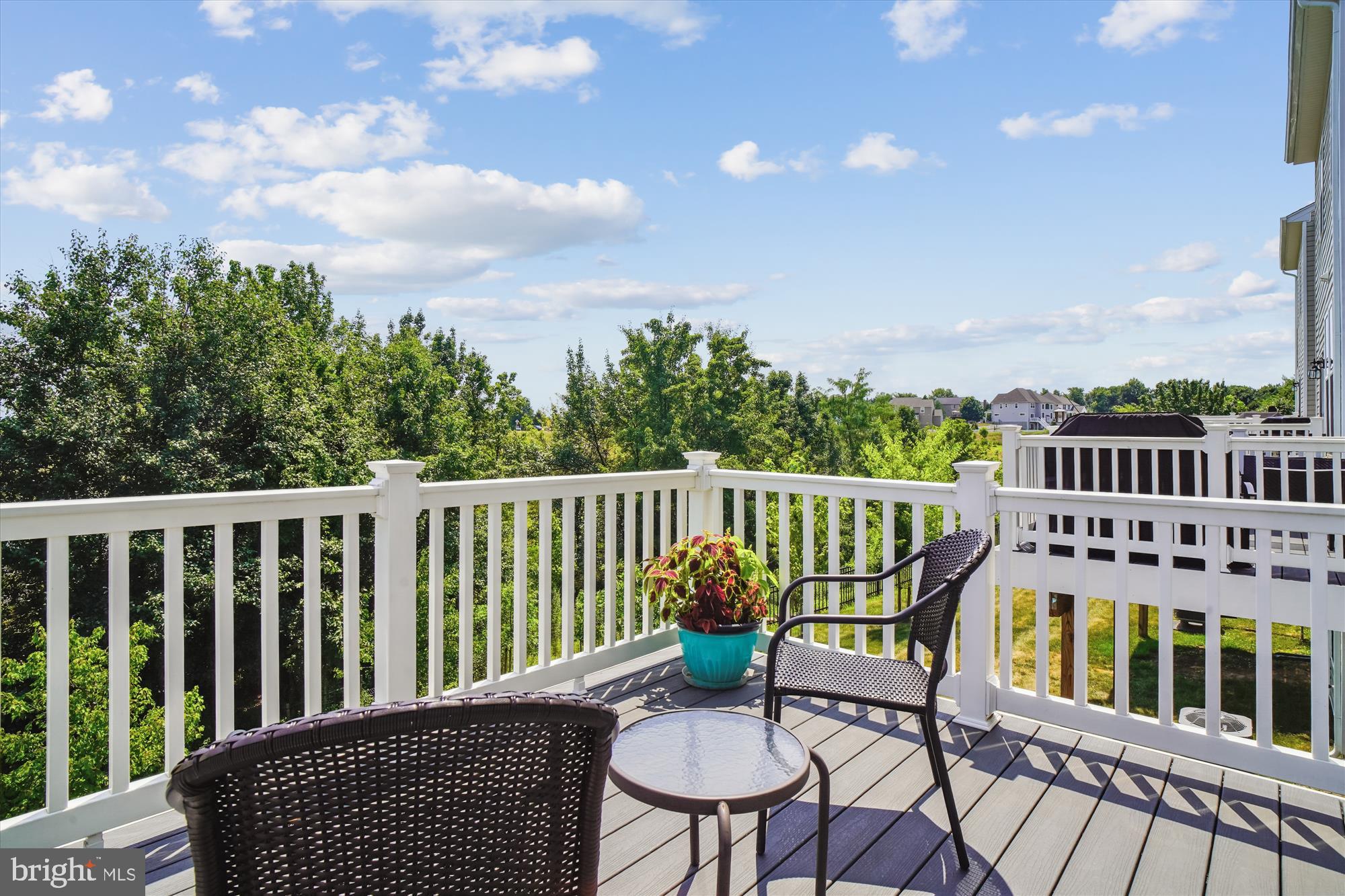 Welcome to the largest model townhouse in The Preserve at Tuscarora! It is packed with style, space, flexibility & smart home technology. With 3 bedrooms, 3.5 baths, two-car garage, and a deck that backs to a peaceful wooded area, it’s got everything you need! Off the 2 car garage is a great bonus space that can be a rec room, home office, guest suite, playroom, or even a 4th bedroom since it already has its own full bath. Off this bonus space is a slider that takes you to the private back yard that could be fenced in or left open to enjoy the open space & trees. The main living area is open and bright with big windows and recessed lighting with 9' ceilings. The kitchen is a total standout—sleek stainless-steel appliances, granite countertops, a big center island, with plenty of cabinets. This is where you open the second slider to a large deck and take in the view. No houses right behind you—just trees and green space. No houses in front either!! Look onto common area from each floor whether you are in the front or back of the house! The primary suite has a spacious walk-in closet and a private bath with a walk-in shower and double sinks. The three bedrooms have LED lights that can be changed out for ceiling fans and the bathrooms have granite counter tops. Washer and dryer are in the hall of the bedroom level making laundry a snap! The home smart features include front door camera, Wi-Fi garage door openers, Z-Wave thermostat/light switch/door lock. Living in The Preserve at Tuscarora means you can walk outside your door to the community's walking trails and playground. You feel tucked away but are just minutes from shops, restaurants, and commuter routes. Come see it for yourself, and get ready to fall in love.