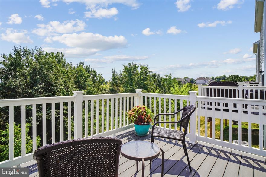 Look at this price drop!  Welcome to the largest model townhouse in The Preserve at Tuscarora! It is packed with style, space, flexibility & smart home technology.  With 3 bedrooms, 3.5 baths, two-car garage, and a deck that backs to a peaceful wooded area, it’s got everything you need!  Off the 2 car garage is a great bonus space that can be a rec room, home office, guest suite, playroom, or even a 4th bedroom since it already has its own full bath. Off this bonus space is a slider that takes you to the private back yard that could be fenced in or left open to enjoy the open space & trees.  The main living area is open and bright with big windows and recessed lighting with 9' ceilings. The kitchen is a total standout—sleek stainless-steel appliances, granite countertops, a big center island, with plenty of cabinets.  This is where you open the second slider to a large deck and take in the view. No houses right behind you—just trees and green space. No houses in front either!! Look onto common area from each floor whether you are in the front or back of the house! The primary suite has a spacious walk-in closet and a private bath with a walk-in shower and double sinks. The three bedrooms have LED lights that can be changed out for ceiling fans and the bathrooms have granite counter tops.  Washer and dryer are in the hall of the bedroom level making laundry a snap! The home smart features include front door camera, Wi-Fi garage door openers, Z-Wave thermostat/light switch/door lock.  Living in The Preserve at Tuscarora means you can walk outside your door to the community's walking trails and playground.  You feel tucked away but are just minutes from shops, restaurants, and commuter routes.  Come see it for yourself, and get ready to fall in love.