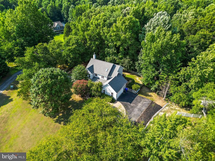 Tremendous Value! Immaculate and updated Home with Full Basement on 3 Acres! This beautiful home offers an open floor and several updates that will be sure to impress. The spacious kitchen is equipped with granite countertops and newer cabinetry.  The main level office is perfect for those who work remotely. Upstairs you'll find generous size bedrooms, including the owner’s suite with a private bath, walk-in closet, and sitting area, or could be used as a 4th bedroom. The basement allows for plenty of extra space for storage or could be finished for added living space. Relax on the screened porch, leading to the multi-level deck and fully fenced in backyard, perfect for entertaining. You'll fall in love with this amazing home as soon as you enter the driveway lined with Cherry Blossoms.  Situated on 3 acres, at the end of a cul-de-sac for extra privacy, this home will not disappoint.  Call today to schedule a time to view this stunning home!