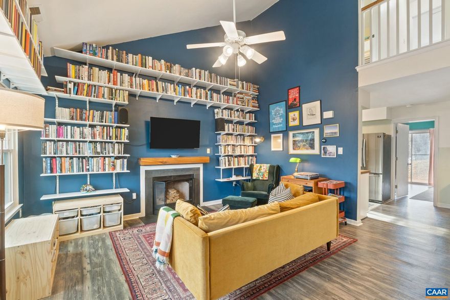 Set just steps from Riverview Park, this thoughtfully updated townhouse offers the rare combination of a fully fenced yard, a first-floor primary suite, and peace of mind you can actually feel.  The main living area features vaulted ceilings that bring in light and volume, while the primary bedroom on the main level makes everyday living easy and flexible. Both the living room and primary bedroom will be freshly painted, and the built-in bookshelves will be removed?creating a clean slate for the next owner to customize the space to their taste.  Behind the scenes, the heavy lifting has already been done. All original Qest plumbing has been fully replaced, along with all new windows and a new roof (2020?2021). The kitchen was refreshed with new counters and sink in 2022, and major systems have been updated with a new HVAC system and chimney cap in 2024. In short: the big updates are complete, the location is convenient if being close to the park is part of your lifestyle, and the next owner can move in without worrying about what?s next?just how they want to make it their own.,Wood Cabinets,Fireplace in Living Room