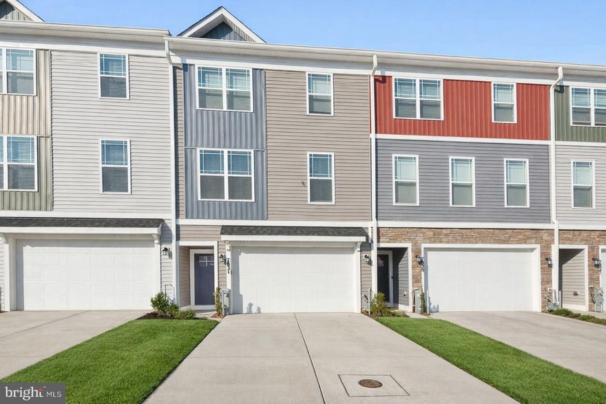 Welcome Home! The community is located directly across the street from Severn Danza Park, one of Anne Arundel County's premier parks, and within a short distance to a variety of restaurants and shops. Three bedrooms, three and half bath homes offer a finished lower level with a spacious closet and full bath which could be an entertainment area, large office, or a Fourth bedroom. Enjoy a large Primary bedroom with an en suite master bath, an open concept main level, and over 2,000 square feet of living space spanning three floors.  Some additional features of the home: First Floor Garage Entry with Closet, Stainless Steel Appliances complete with a 5 Burner Gas Range, Painted Kitchen Cabinetry, Granite Kitchen Countertops, Natural Gas Heat, Luxury Vinyl Plank Flooring throughout, electric charging station prewire in garage, and window blinds.
