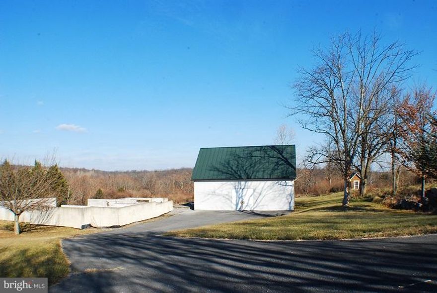 Beautiful 5.31 Ac with 2 Car Over sized Garage with storage room Metal roof. Foundation for home next to Garage . Property sold strictly as is .Owner occupant offers accepted until First look initiative expires 3-22-18. Home Sitting on VA /WV line . Has WV Tax Record and VA Address . Septic and well on property LA has no reports ,Buyer to confirm .