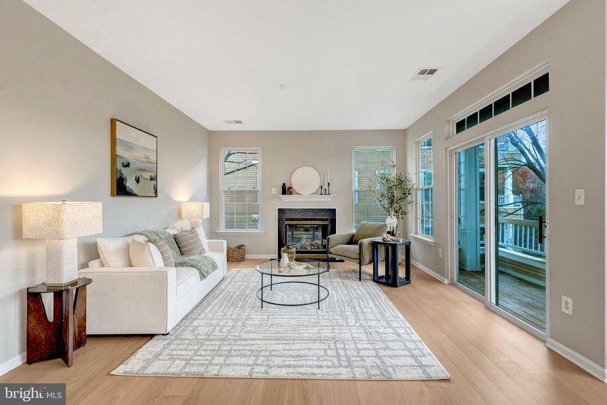 Welcome to 4200 Mozart Brigade Ln, Unit Q — just two short flights up to a bright and inviting 3-bedroom, 2-bath condo offering approximately 1,500 square feet of open-concept living in the heart of Fairfax.

True three-bedroom condominiums are rare, and this well-designed layout offers flexibility for a home office, guest space, or additional living needs. The living, dining, and kitchen areas flow seamlessly and are filled with natural light from large windows. Private balcony with peaceful pond views.

Recent updates include engineered hardwood flooring (2024), updated primary bathroom (2024), furnace (2023), hot water heater (2022), and HVAC (2021). Ample storage throughout.

Community amenities include pool, clubhouse, fitness center, tennis courts, walking trails, playground, and reserved parking. Convenient location near Fair Lakes, Fairfax Corner, and major commuter routes including I-66, Route 50, Route 286, and Route 28. Approximately 15 minutes to Dulles Airport and Silver Line Metro.

**Note: Special Assessment fee of $84.51 is only through the end of this year, 2026.**