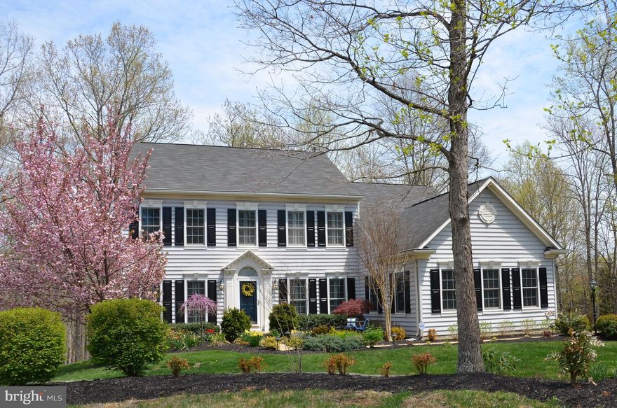 *3 Car Garage* 4700+ Finished SQ Ft 3 Finished Levels Meticulous 1+Acre Corner Lot Hardwood Floors Entire Main Level&Upper Hallway Renovated Gourmet Kitchen w/Cherry Cabinetry&Vaulted Morning Room Family Room w/Gas F/P Plantation Shutters Luxury Master Suite Amazing Finished Basement w/Bar,Rec Room,Guest Suite&2nd F/P Trex Deck&More! Extensive Landscaping Tiered Decking Backs to Common Area!