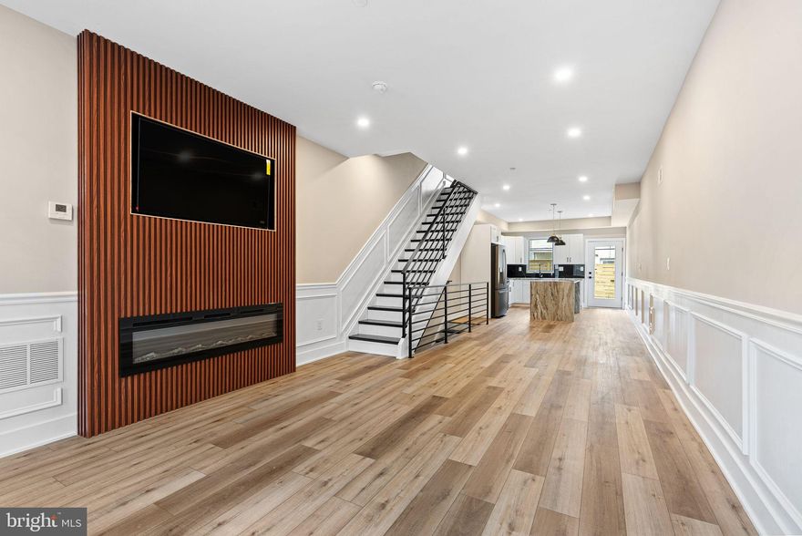 Welcome to 2720 Wharton Street, an impressive new construction located in the bustling Grays Ferry neighborhood of Philadelphia. This outstanding property, currently in progress, is set to offer over 2,500 square feet of luxurious living space. Designed with contemporary living in mind, this home includes 3 generously sized bedrooms and 3 full bathrooms, providing abundant space for comfort and relaxation.

Situated on a larger lot, the property allows for an expansive open layout on the first floor. This generous space accommodates a formal living room, a formal dining area, and a massive kitchen, perfect for entertaining and family gatherings.

The heart of the home is a chef’s haven kitchen with granite countertops, a full slab granite backsplash, and a large island with a waterfall edge, offering both style and functionality. It also boasts a brand new appliance package, ensuring top-of-the-line performance and convenience.

Beautiful wide plank flooring stretches through the entire home, adding to its elegance and cohesion.

On the third floor, you will find the primary suite, which occupies the entire level. It features a massive spa-like bathroom, large closets, and a spacious bedroom, providing a private sanctuary for relaxation and comfort.

A magnificent roof deck crowns the home, offering unobstructed views of the city skyline, making it an exceptional spot for enjoying panoramic views and hosting gatherings.

The finished basement is ideal for a home office, gym, or entertainment area. It also has a full bathroom for ultimate convenience.

Additionally, the home benefits from an approved tax abatement, providing significant financial savings for future homeowners.

Constructed by a developer renowned for creating stunning homes, you can expect exceptional quality and meticulous attention to detail throughout this property. Don’t miss the opportunity to make this remarkable home yours.