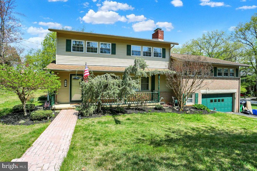 Welcome home to 305 Lynoak Avenue, located in the desirable Shillington Boro in the Governor Mifflin School District on a corner lot! This spacious home offers five bedrooms and three and a half bathrooms, providing plenty of room for everyone. The front of the home features charming landscaping and a large front porch  perfect for relaxing and enjoying the fresh air. Inside, you'll find a foyer that opens into a cozy living room with a beautiful brick fireplace and hardwood flooring throughout. The dining room boasts lovely windows and a ceiling fan, bringing in plenty of natural light. The kitchen offers ample cabinet space, tile flooring, and includes all appliances. The kitchen window above the sink overlooks the yard. Upstairs, the primary bedroom features its own full bathroom. Two additional bedrooms share another full bath on this level. A few steps up, you’ll find two more bedrooms and a third full bathroom, ideal for guests or a home office setup. Downstairs, there’s a convenient laundry room and a spacious recreation area with windows and direct outside access. The side porch and nice-sized backyard make for great outdoor living spaces. This home is within walking distance to schools and just minutes from local dining, shopping, and major highways. Don’t miss your chance schedule your showing today!