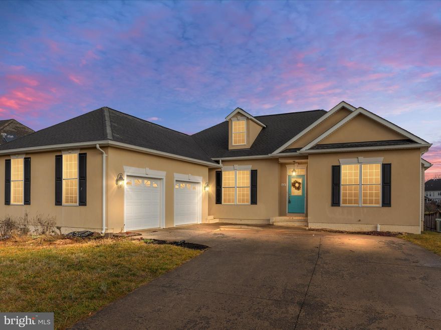 Step into this expansive Colonial home with 4 bedrooms and 3 1/2 bathrooms, nestled in the coveted Camp at Mosby Station subdivision in Stephens City.  Convenient location for commuters accessing I-81 and Rt. 522, 1 mile from Walmart and minutes to restaurants, gas stations, etc.!  The foyer welcomes you with an open floor plan adorned with hardwood floors, high ceilings, elegant columns, and crown moldings. The kitchen boasts ample 42" cabinetry, a pantry, and Corian countertops.

As you explore, the living room beckons with a gas fireplace and French doors leading to a spacious Trex deck. To the right of the foyer, discover two bedrooms connected by a Jack and Jill bathroom. To the left, the primary bedroom awaits, complete with an ensuite featuring "His and Her" walk-in closets, a tiled standup shower, and a jacuzzi tub.

Descend the stairs to the partially finished basement, where endless possibilities await to transform this space into your dream home. The basement includes another bedroom, a full bathroom, three bonus rooms (potential bedrooms), a utility room, and additional storage. With over 4000 square feet when fully finished, this home offers abundant space.

Convenience is key with a 2-car garage leading to a mud/laundry area and a half bathroom. Outside, a fenced rear yard, trellis, stepping stones, and a greenhouse complete the picture. Don't miss the chance to make this home yours—schedule your showing today!