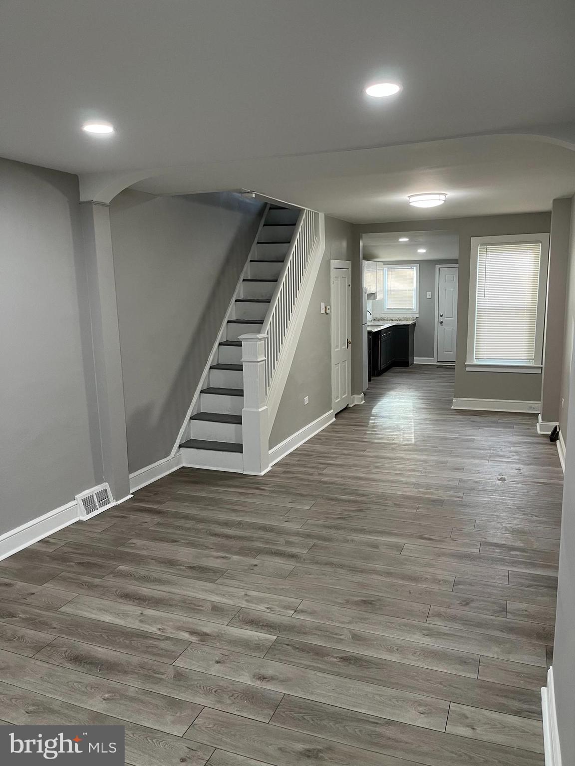 Fully renovated spacious beautiful 2-bedroom townhome on great private street. Everything is NEW! Come in to see the brand new flooring throughout entire home, all new recessed lighting, brand new kitchen with premier cabinets and countertops, brand new bathroom with full custom tile tub and vanity, full basement with washer and dryer, fenced in yard for your BBQ fun and plenty of parking in front or side of home. Home also offers a lot of storage/closet areas and has been freshly painted, including the basement area. Truly a great street and home that will not last! Make your appointment today!