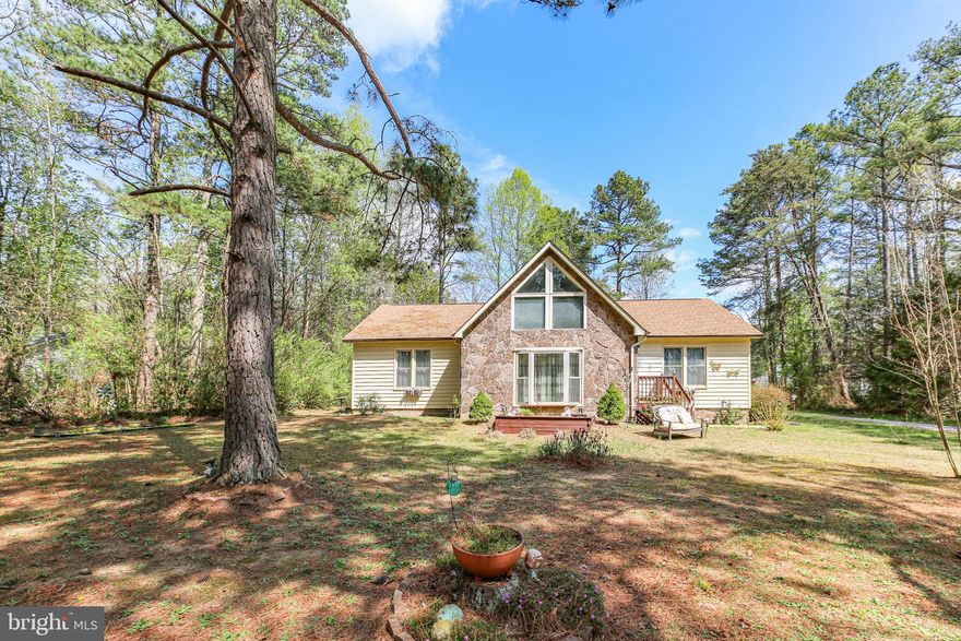 Nestled in the serene Lake Caroline community on a rare double lot (with only one HOA fee due to merged lots with County), this charming home offers a perfect blend of comfort and modern updates. The interior features striking cathedral ceilings in both the kitchen and the living room, which is anchored by a wood-burning fireplace currently outfitted with electric logs. The functional layout includes primary bedroom with a full bath, a second spacious bedroom features a large walk-in closet and access to a second full bath with a skylight. For those needing extra space, a spiral staircase leads to a versatile loft/office that could easily be converted into an additional bedroom.  Pull down attic stairs with additional storage in the attic as well. 

The home is designed for brightness and efficiency.  Recent exterior improvements include new gutters, while the mechanical systems have been meticulously maintained with bi-annual HVAC service and a newer water heater. The outdoor living space is enhanced by a dining area that leads to a deck and a storage shed. This property  is a well-cared-for sanctuary ready for its next chapter.  Roof is approx 7 years of age as well as at time of roof install - both skylights along with kitchen and bath windows were replaced.