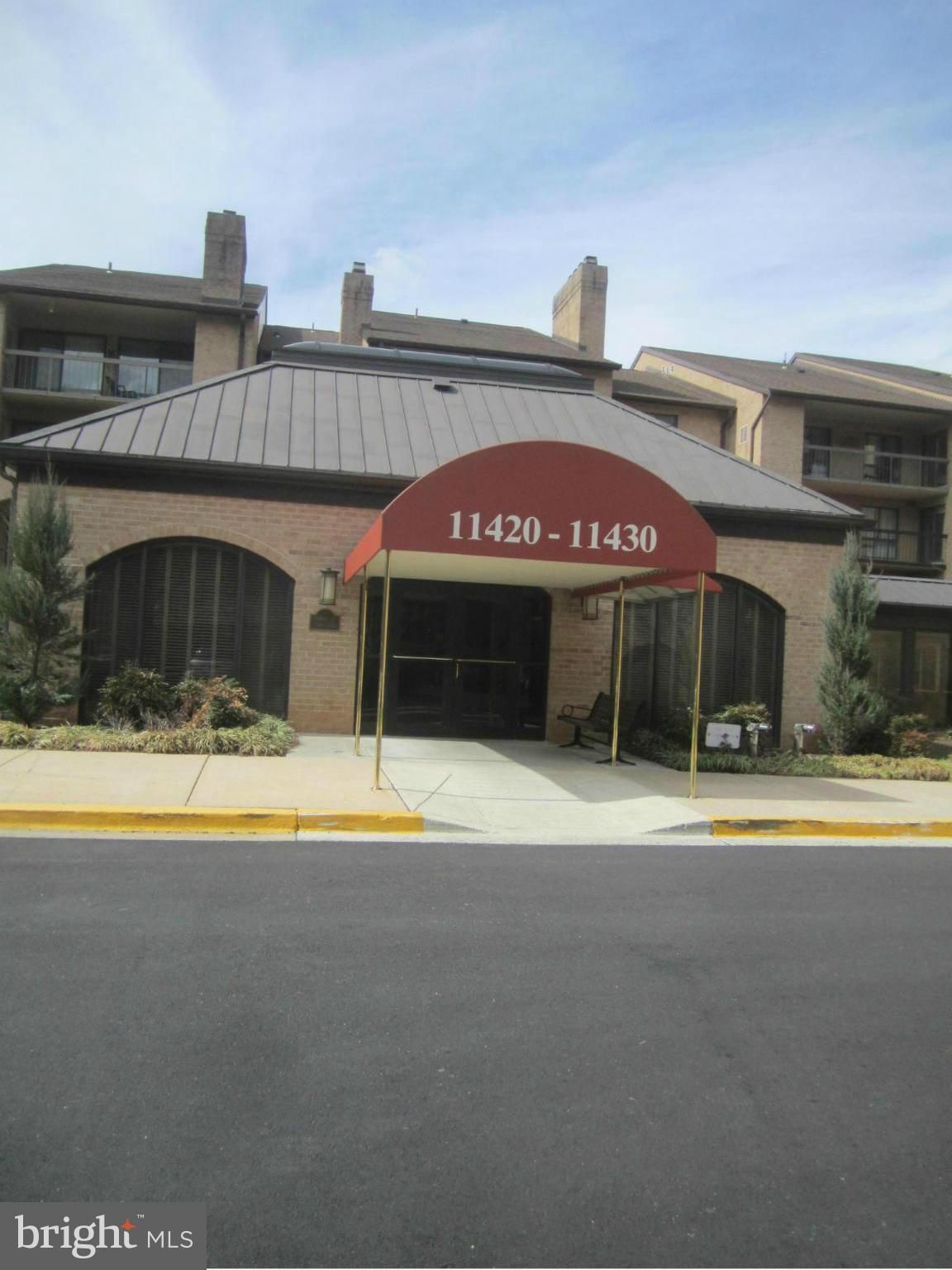 Renovated Spacious Light Filled 2 Bedroom 2 Bath Apartment- Beautiful Treed Views--Ceramic Floors in Kitchen, Bathrooms, Laundry Room & On Balcony Plus Full Size Washer & Dryer-Enjoy the Swimming Pool, Tennis Court & Exercise Room-Walking Distance to Lovely Trail to DC, Metro, Shopping, Restaurants, etc..-3 Walk In Closets-Storage Room Next to #13 Garage Space-Full Time Property Management Office