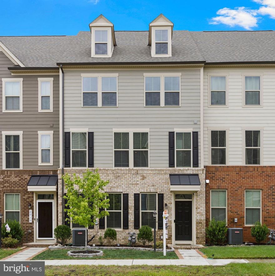 Nothing says LOCATION, LUXURY & LIFESTYLE quite like Potomac Shores, and nothing says WELCOME HOME quite like 2008 Serviceberry Rd! WHY WAIT TO BUILD NEW WHEN YOU CAN OWN NOW! You won't believe you are in a townhome as soon as you tour this exquisite 2-YR YOUNG property....IT FEELS & LIVES LIKE A SINGLE FAMILY, with OVER 2,700 SQ FT of luxurious, Open living space! This home is the LARGEST TOWNHOME FLOORPLAN in the Woods Overlook section of Potomac Shores. Your new home features the following: Craftsman Interior Detail package. ALL TV'S & MOUNTS CONVEY! Extra wide Staircases with Hardwood steps. 3 FULL BATHS (one on main level). Finished Garage with custom floors & 220V Charging station for your Electric vehicle. STATE-OF-THE-ART Security System & more! You'll be impressed with the Open & Light-filled main level, perfect for entertaining! This home has 2 SHOW STOPPERS.....FIRST, you'll be able to Chef it up in your Gourmet kitchen complete with Upgraded Stainless Steel appliances, Gas Cooktop, tons of Rich espresso cabinetry and a huge center island with Granite countertops and extra storage & seating! SECOND, you get to sit back, grab a glass of Merlot or mug of Coffee & enjoy your very own 160 SQ FT, Heated & Cooled, FULLY ENCLOSED 4-season Porch complete with mini-fridge & Electric COOKTOP & FIREPLACE...Talk about Living the Life!! The main level is complete with a custom TV Wall Mantle & a gorgeous Powder Room for your guests. Head upstairs and you will find 2 Large secondary Bedrooms, a Full Hall Bath with Tub & Tile upgrades, Custom Barn Doors to your full Laundry and last but not least....the Sumptuous Owner's Suite that has a true Spa Bath w/Dual Vanities, Huge Soaking Tub, Ultra Lux Rain-head Shower, and a WALK IN CLOSET that ALL YOUR FRIENDS WILL ENVY! Once you complete your tour, you will want to call this place HOME! And yes, ALL OF THIS in a community that feels like a Resort....Potomac Shores is truly the Ultimate Destination, complete with 3 magnificent pools, 3 schools, Tennis & Basketball courts, Open Green spaces to play fetch with your Pups, Tot Lots, Sidewalks, onsite Restaurant, Bar & Golf Club, State-of-the-Art Gym, Jack Nicklaus Golf Course, multiple jogging trails, Ali Krieger Sports Complex, and so much more! Conveniently located just minutes to I-95, Rt. 1, Quantico, Stonebridge Town Center, Potomac Mills, Restaurants & more! Verizon Hi-Speed FIOS included in your HOA payment! FUTURE VRE STATION & TOWN CENTER Planned & Under Development!