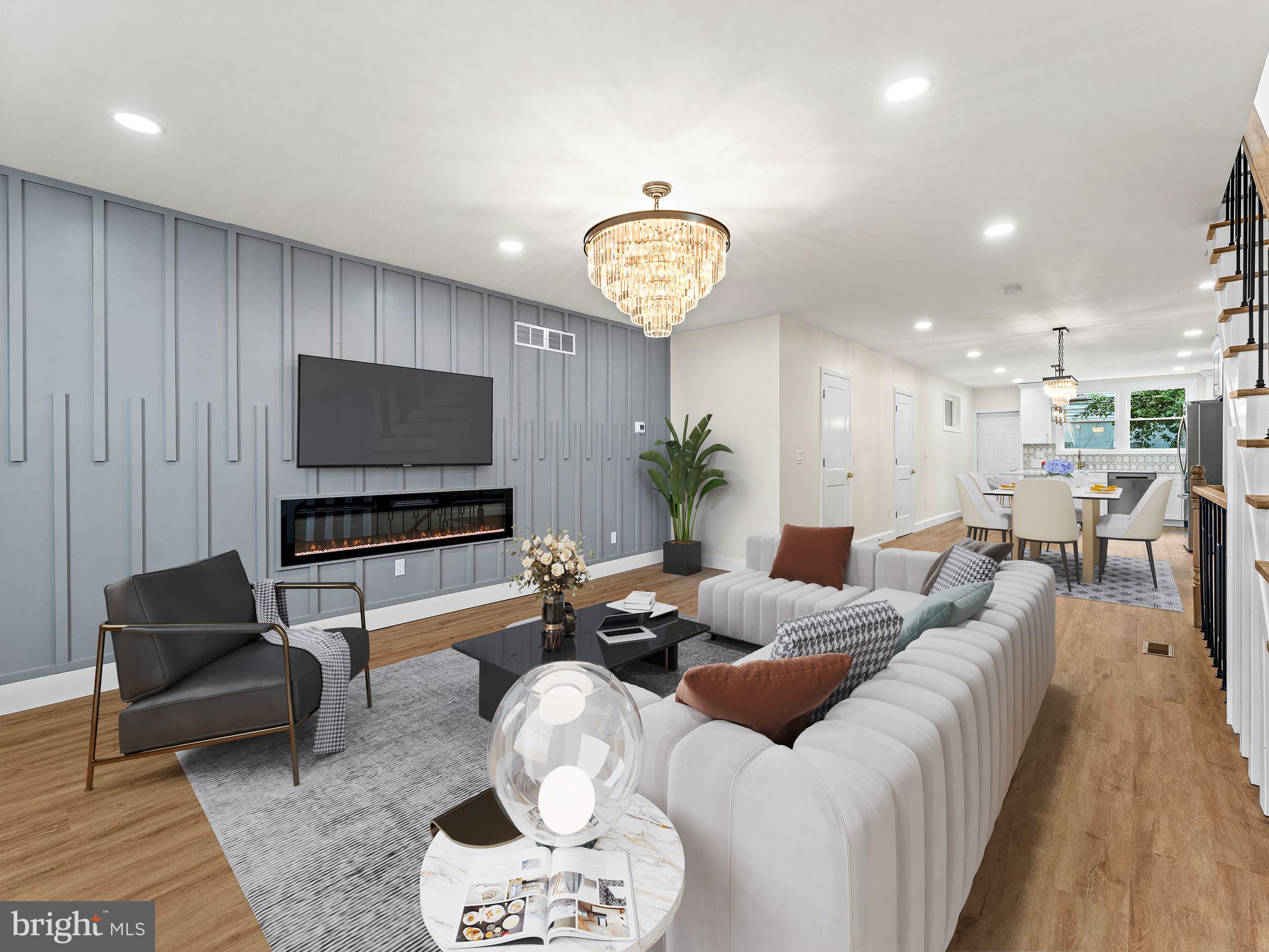 This South Philly stunner truly has it all! Fully renovated from top to bottom, this end-row home sits on an oversized 18-foot-wide lot—a rare find in the city. Offering 4 bedrooms, 3.5 bathrooms, and high-end finishes throughout, this property is the perfect blend of style, space, and convenience. Step inside to an open-concept living and dining area accented by beautiful chandeliers, flowing into a custom chef’s kitchen with a large eat-in island, stainless steel appliances, gas cooking, and a walk-in pantry. The fully finished basement provides additional living space and a private 4th bedroom with a full bath—ideal for guests, a home office, or a workout space. Upstairs, spacious bedrooms and modern bathrooms complete the home, with every detail thoughtfully designed. Enjoy year-round comfort with brand new HVAC, plumbing, and electric systems, and relax or entertain outdoors on your private back patio. Located just steps from public transit, and South Philadelphia’s best restaurants, cafes, and shops, this move-in ready home is one you won’t want to miss.