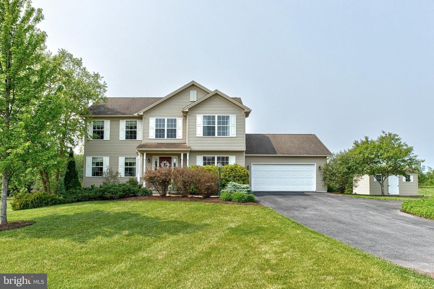 Location, Location, Location. This two-story home is situated at the end of a cul-de-sac, adjacent to both Pennsylvania State Game Lands and land owned by the Clearwater Conservancy; you will be able to enjoy beautiful countryside views for many years to come from the recently renovated rear deck and patio. The home has been well-maintained with updates of additional hardwood floors, a new gazebo in the newly partially fenced-in backyard with loads of perennials and some raised bed gardens! Featuring a bright kitchen with natural light, solid surface countertops and peninsula island that is open to the spacious family room with a cozy propane fireplace.  The first floor also contains a bright dining room and large living room, as well as a striking entry area with an open staircase to the 2nd floor, a half guest bath, and first-floor laundry.  The second floor features an inviting owner's suite with a spacious bedroom, private full bath, and ample closet and storage space. There are three other bright bedrooms. The beautifully finished walk-out lower level has been converted into a large recreation room with workout/kids' play area, storage and utility rooms, and another half-bath for added convenience. The professionally landscaped, fenced-in backyard and covered rear patio area, along with a permanent gazebo, are perfect for relaxing on lazy summer days or entertaining guests.  Located in the Trotter Farms subdivision on a .81-acre lot with gorgeous, picturesque views of the countryside, yet just minutes from downtown State College and Penn State University.