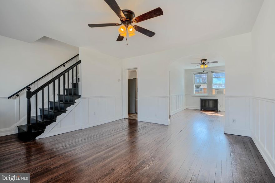 Welcome to 207 W Meadow Rd, an inviting townhouse nestled in the heart of Brooklyn Park, MD. This charming residence offers 1,440 square feet of thoughtfully designed living space, perfect for those seeking comfort and style. As you step inside, you'll be greeted by a bright and open living area complete with gorgeous hardwood flooring and charming historic details. Upstairs, the spacious primary bedroom features dual closets and tons of natural light. The upper level also includes a second bedroom and an updated bathroom. The finished lower level offers great additional space, including an additional full bathroom, utility and laundry area, and a potential third bedroom. This home is conveniently located and provides easy access to a variety of amenities, including restaurants and local parks. Don't miss the opportunity to make this delightful property your new home. Schedule a showing today and experience the comfort and charm of 207 W Meadow Rd for yourself!