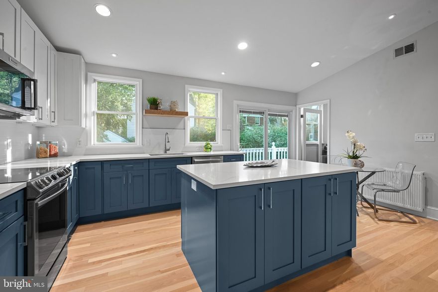 This beautifully renovated 5 bedroom stone cottage in Chevy Chase Terrace is a true gem!  The inviting front porch leads you to a spacious  living room, a formal dining room offering elegant spaces for entertaining while the newly renovated kitchen features an island and a charming table space, perfect for casual meals.  A stylish powder room adds convenience for guests. Also on the main floor you'll find two  bedrooms and a stunning renovated full bath, combining comfort and modern design. The second floor features three nicely sized bedrooms. A well appointed hall full bath serves this level. Additionally, there is a dedicated in-home office, perfect for remote work or study.  The lower level offers a cozy family room.  It also includes a versatile second office/bedroom, ideal for guests or a dedicated workspace.  A newly finished full bathroom adds convenience, making this space functional and inviting.  Plus, with an attached garage, you'll enjoy easy access and added storage options.  Very close to Norwood Park, a close proximity to BOTH Bethesda and Friendship Heights. So close to shopping, restaurants grocery stores and so much more...